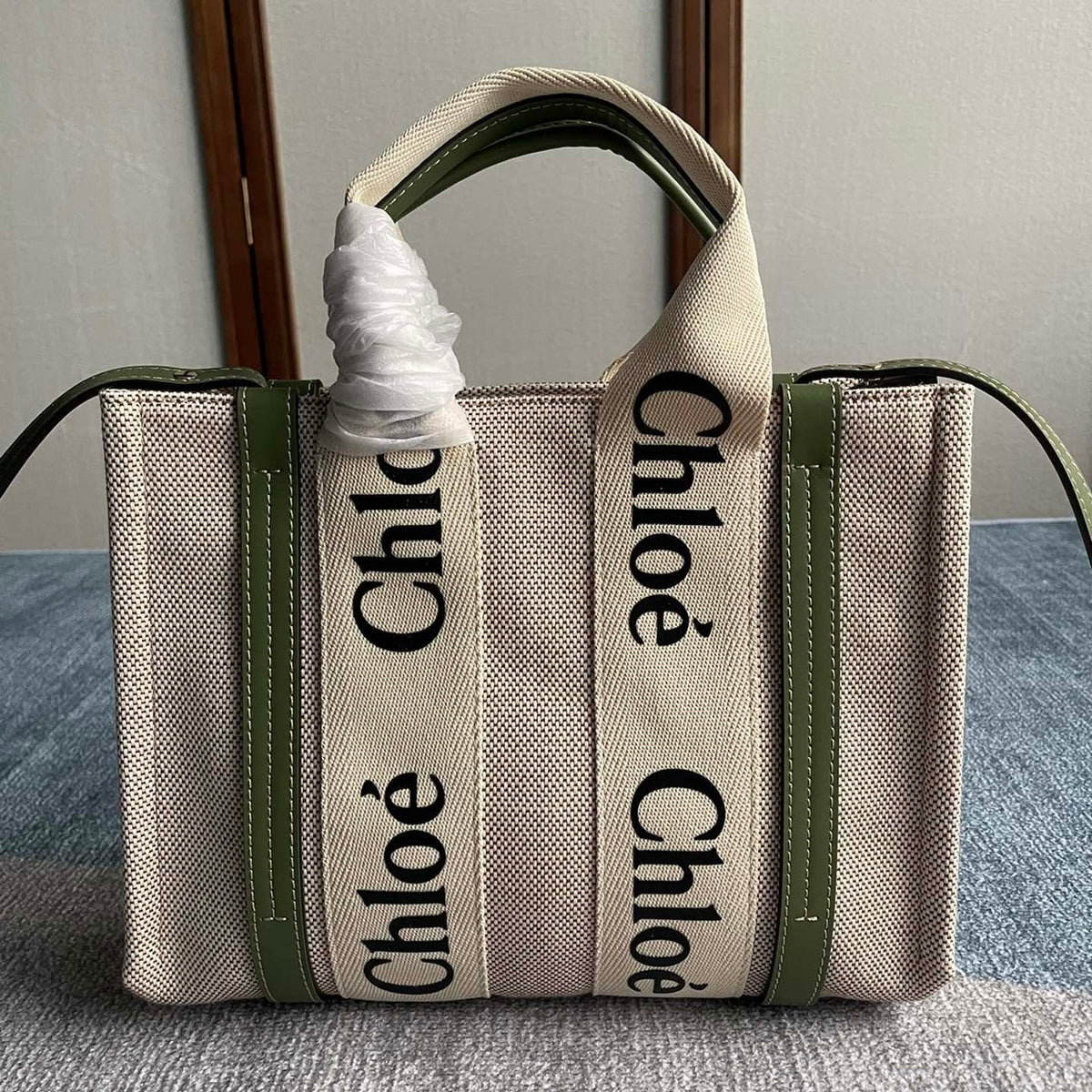 SMALL STRAP WOODY TOTE BAG 26.5 IN BEIGE LINEN CANVAS BLACK WEBBING LOGO EMBROIDER GREEN CALFSKIN