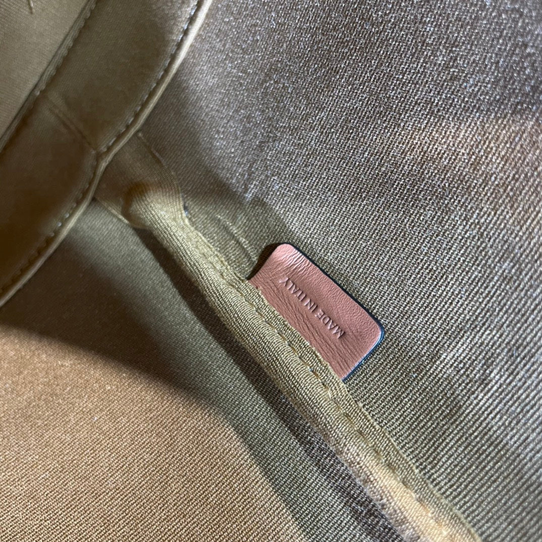 BUCKET 33 IN WHITE TRIOMPHE CANVAS AND BRONZE BROWN CALFSKIN TRIM